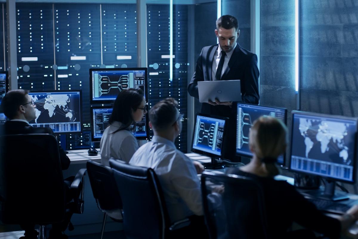 Cybersecurity team monitoring threats in a security operations center protecting law firm data in Nashville